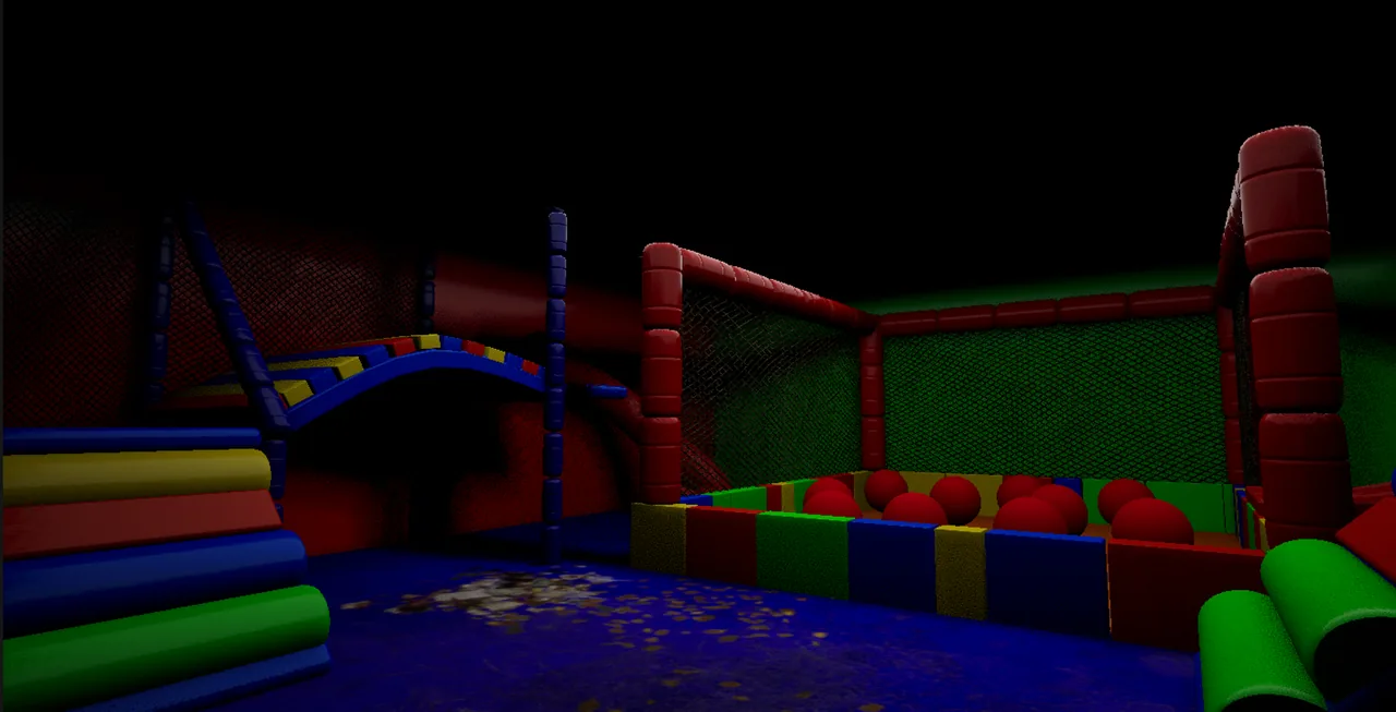 A dim ball pit with red balls and padded climbing structures